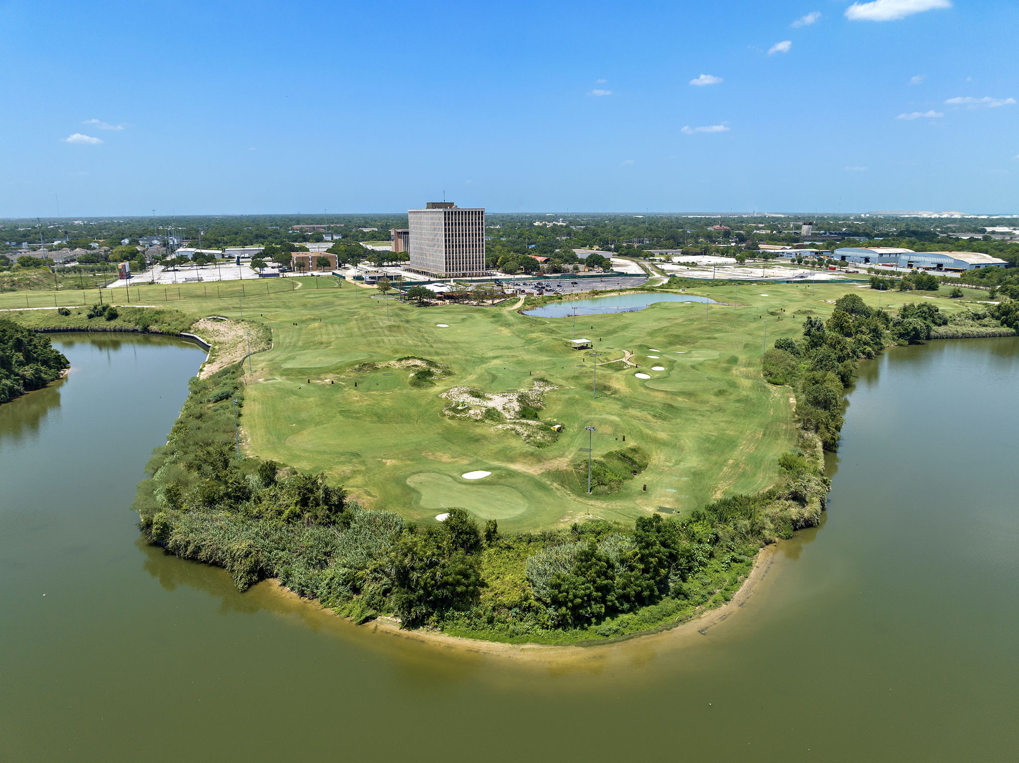 Aerial view of the East River 9 Golf Course, showcasing well-maintained fairways and putting greens.