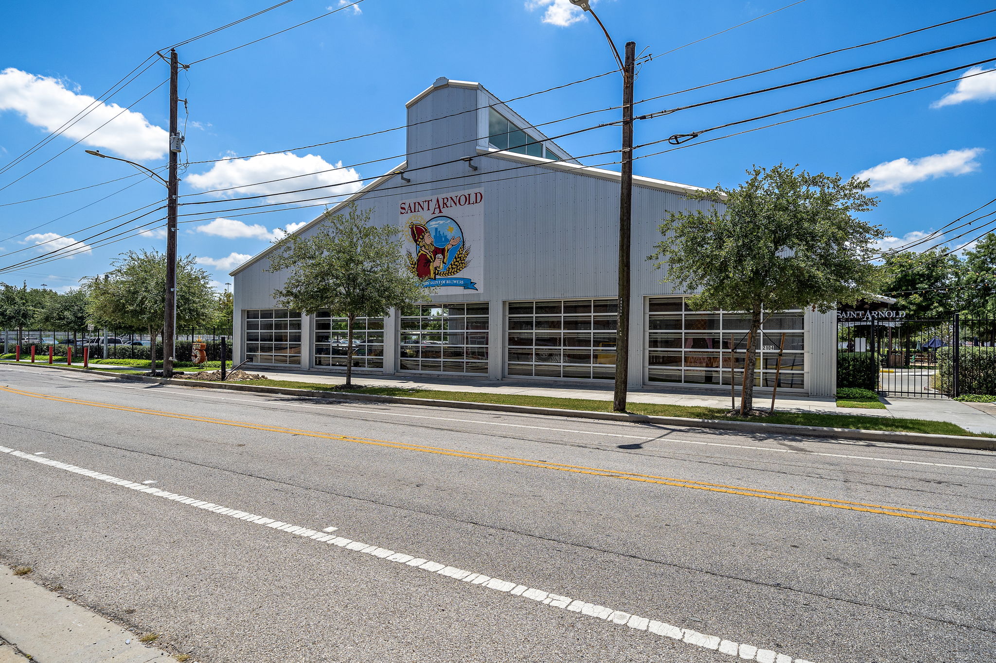 The front of Saint Arnold Brewery with large picture windows